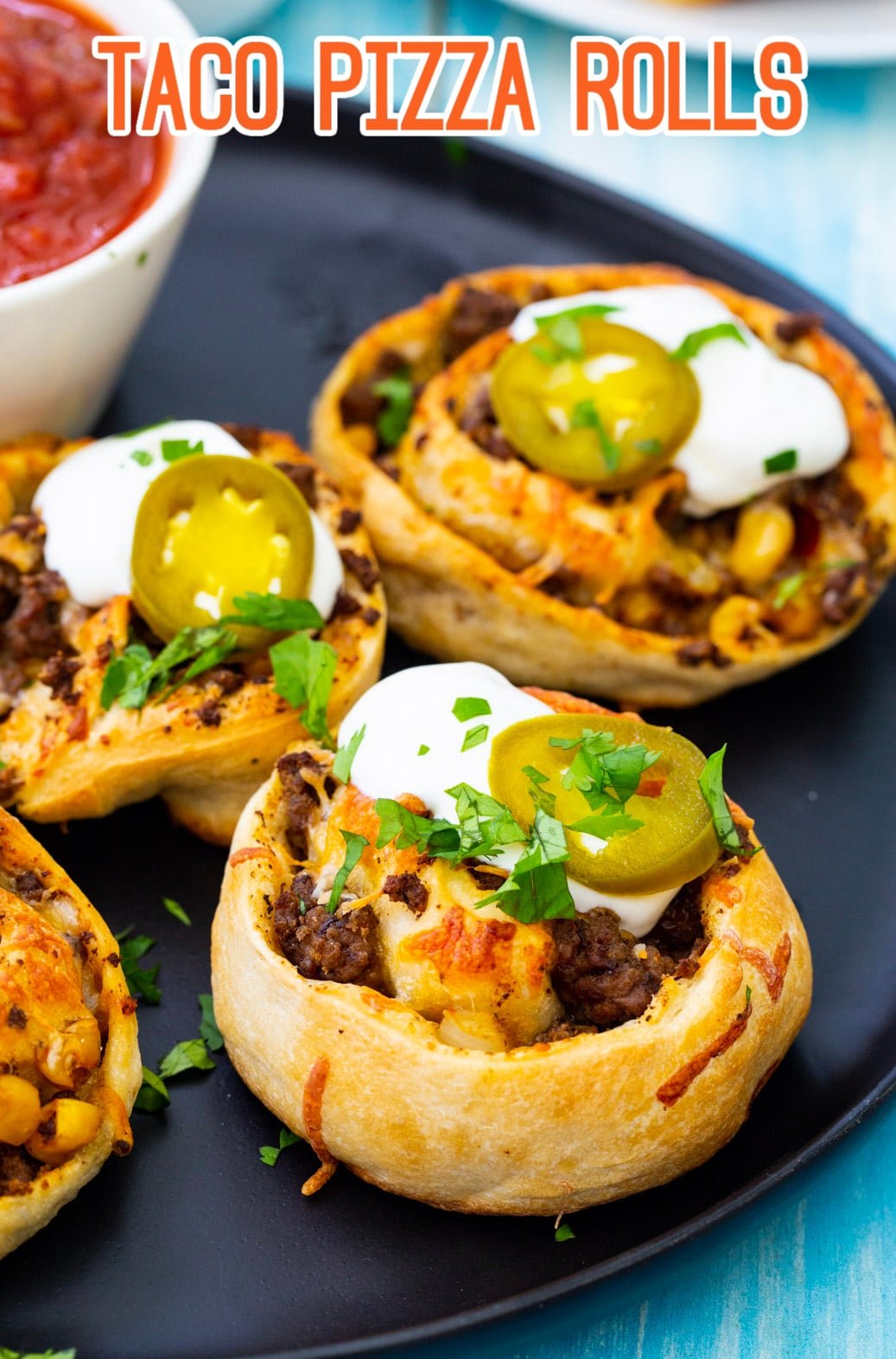 Taco Pizza Rolls on serving plate.