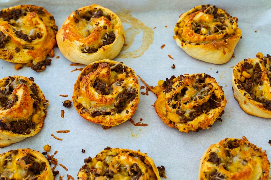 Taco Pizza Rolls on baking sheet.