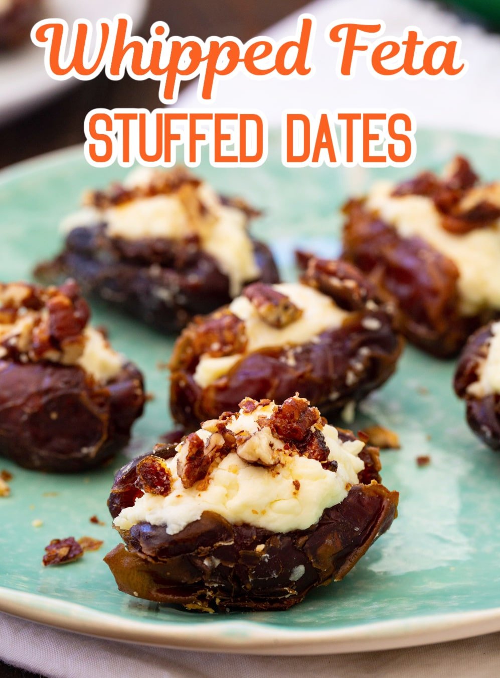 Whipped Feta Stuffed Dates on a plate.