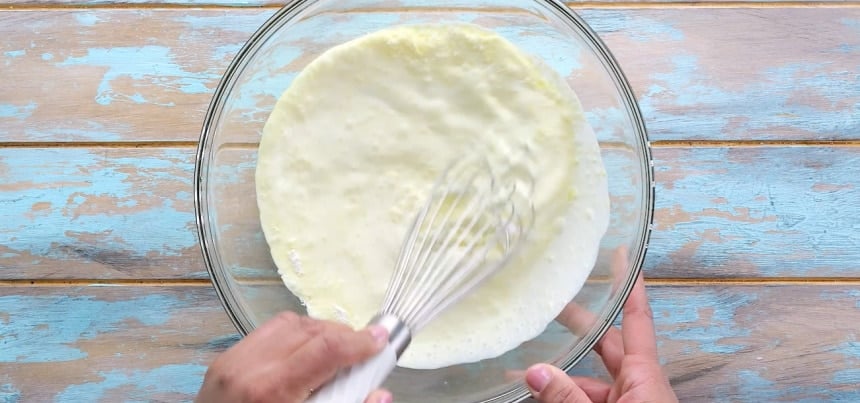 Mixing pudding mix with half-and-half.