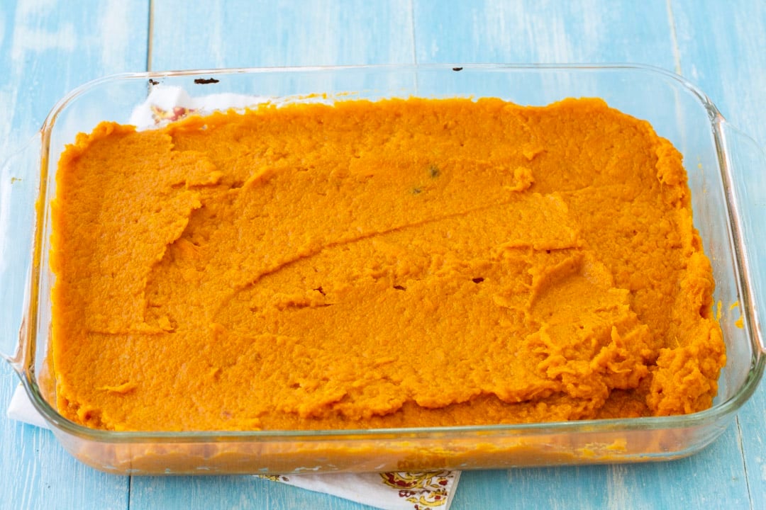 Sweet potato mixture spread in baking dish.