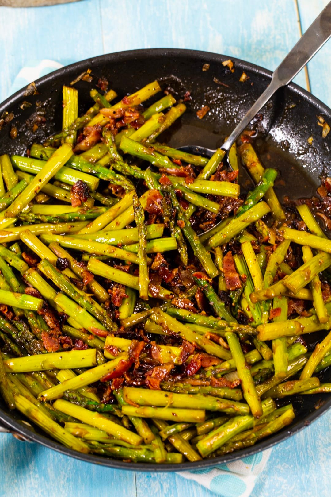 Asparagus in a large skillet.