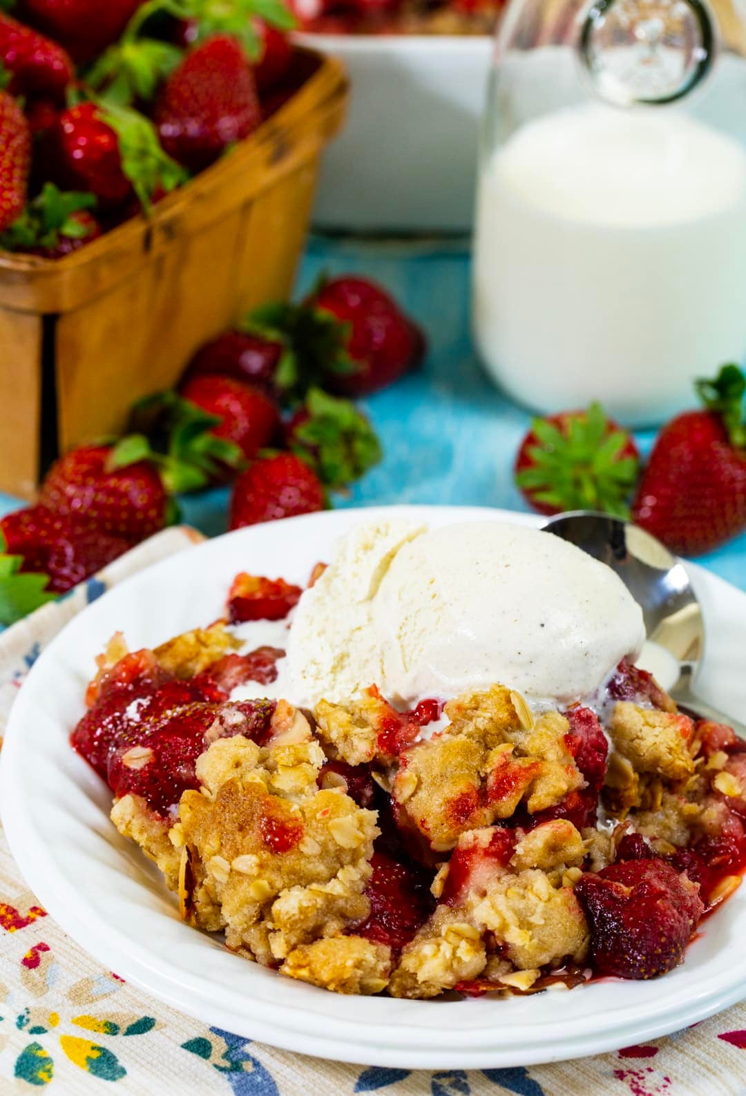 Strawberry Crisp topped with ice cream.