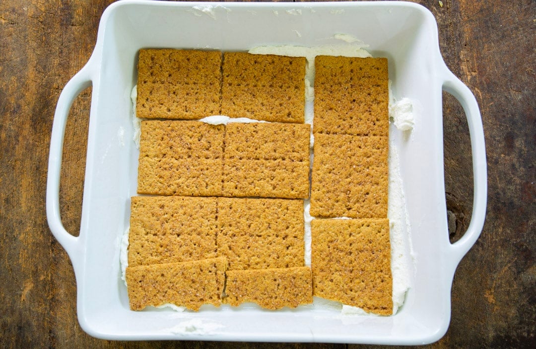 Layer of graham crackers in bottom of baking dish.