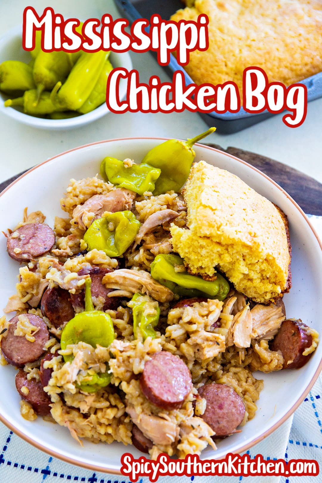 Mississippi Chicken Bog dished up on a plate with cornbread.