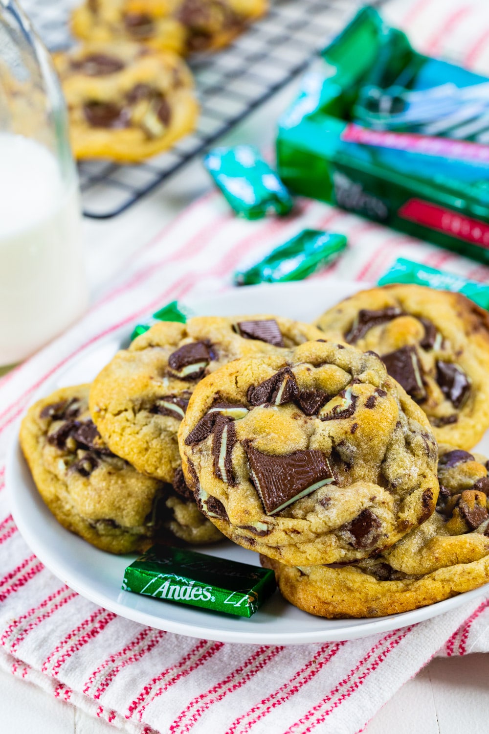 Andes Mint Cookies on a plate with andes mints in wrappers.