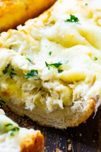 Artichoke and Crab Dip Bread with slice cut out.