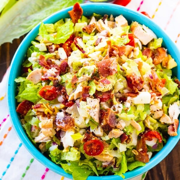 Chopped Cobb Salad in a bright blue bowl.