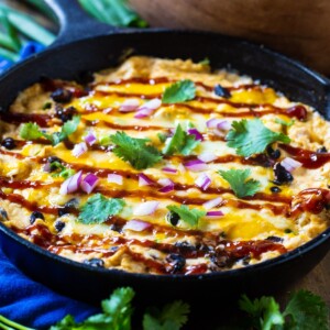 BBQ Chicken Dip in a cast iron skillet.