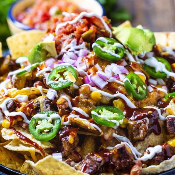 BBQ Steak Nachos and bowl of pico de gallo.