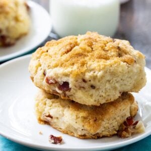 Two Brown Sugar Bacon Biscuits on a plate