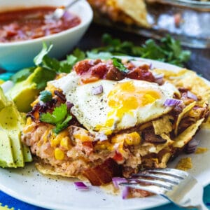 Bacon and Egg Chilaquiles on a plate.