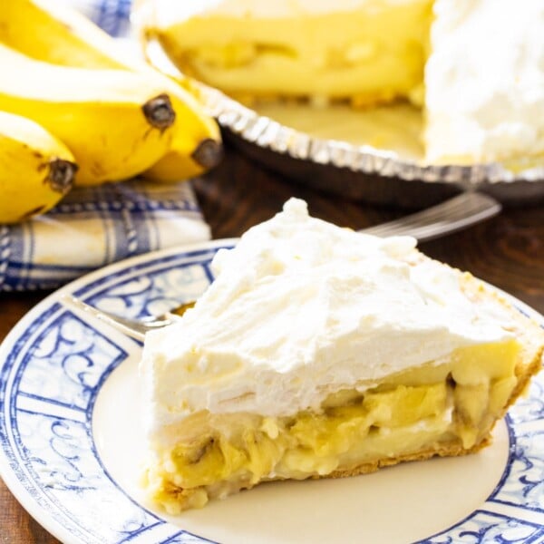 Slice of Banana Cream Pie on a plate.