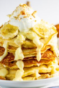 Banana Pudding Pancakes stacked on a plate.