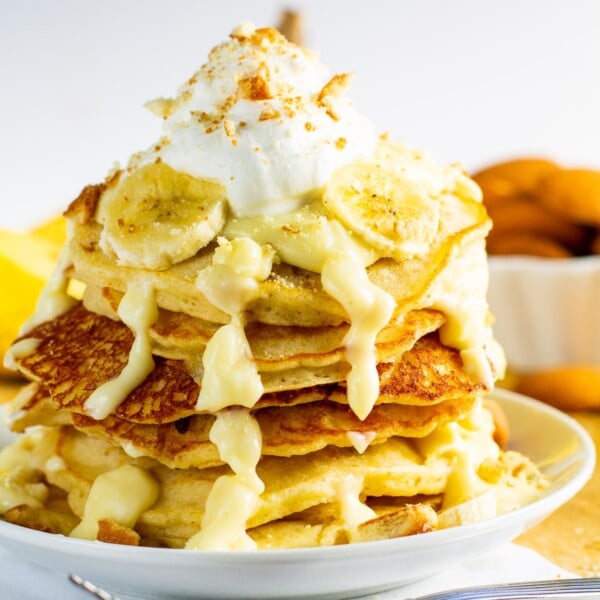 Banana Pudding Pancakes stacked on a plate.