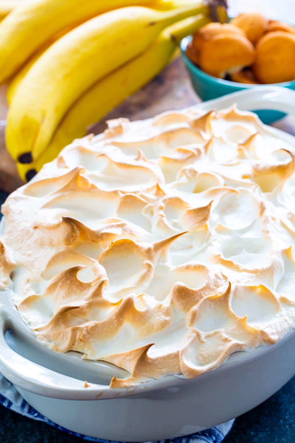 Banana Pudding topped with Meringue in an oval baking dish.