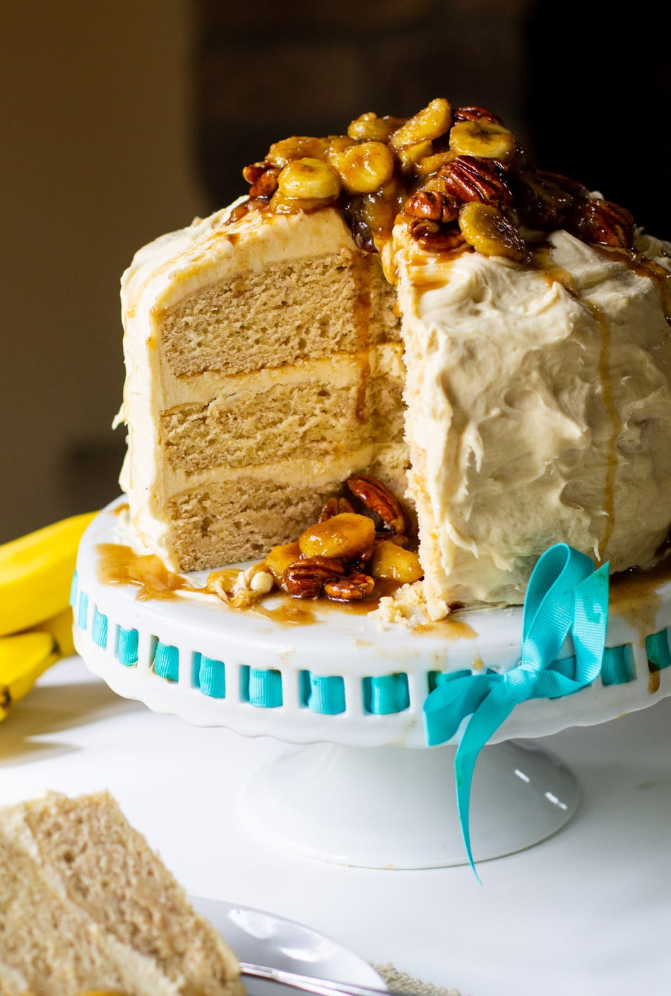 Bananas Foster Cake on cake stand.