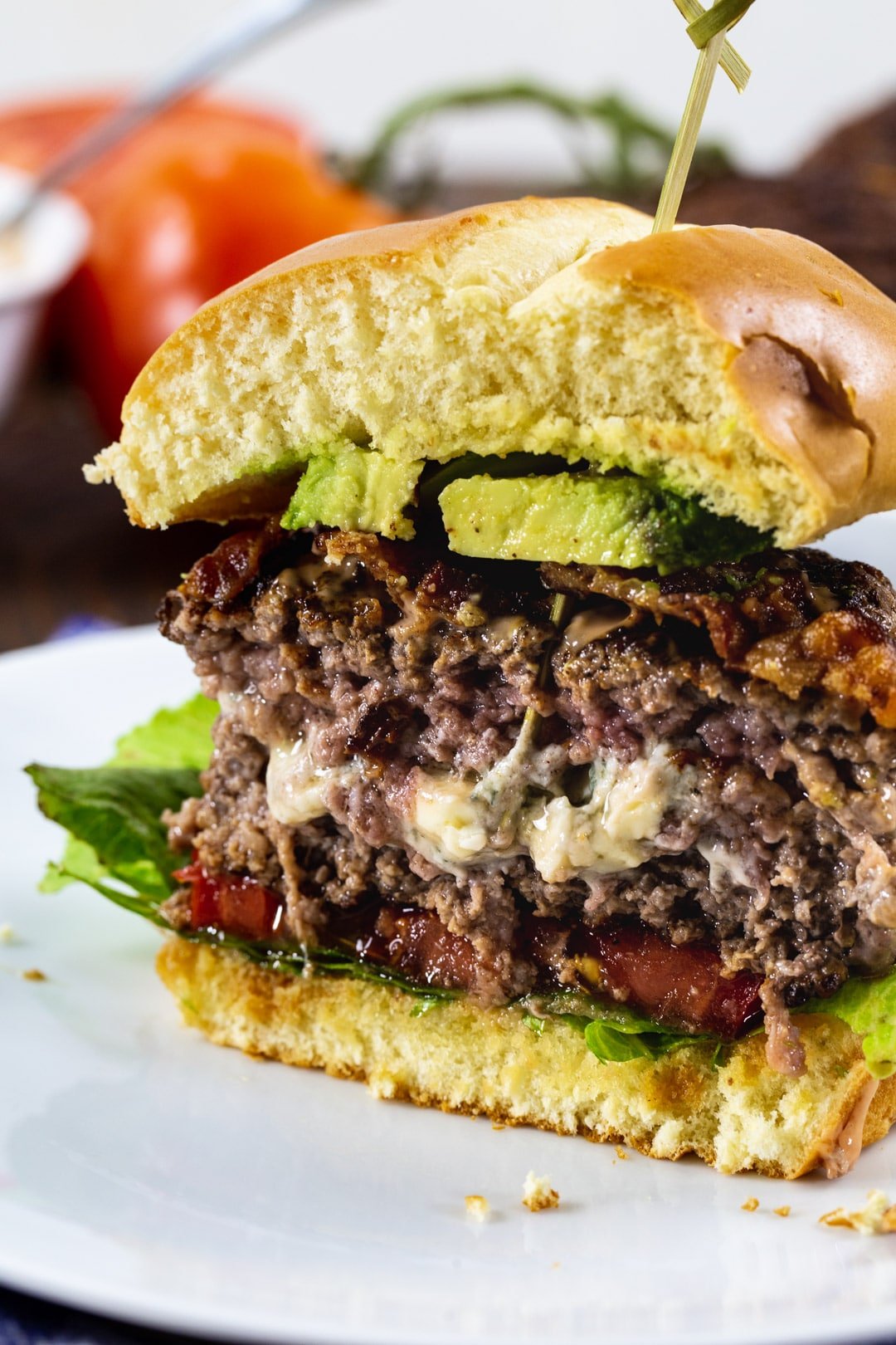 Black and Blue Burgers cut in half to show blue cheese on inside.