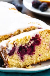 Blackberry Buttermilk Loaf Cake with a slice cut.