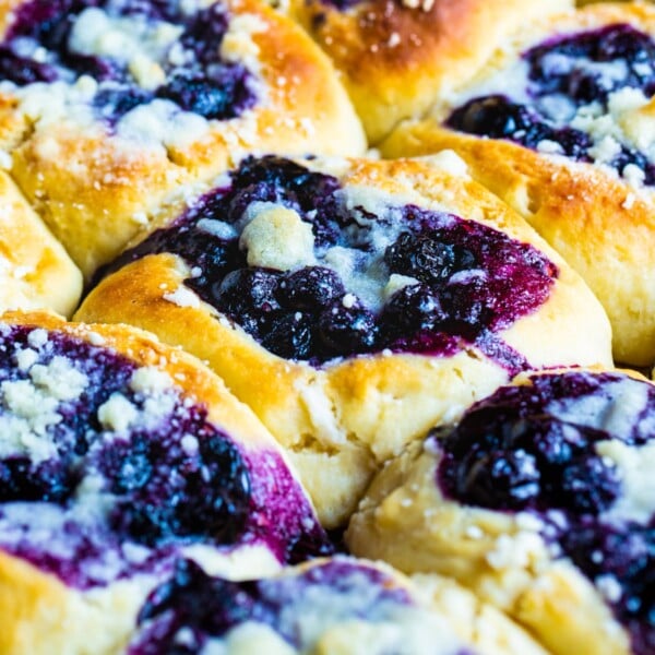 Blueberry Kolaches on a baking tray.