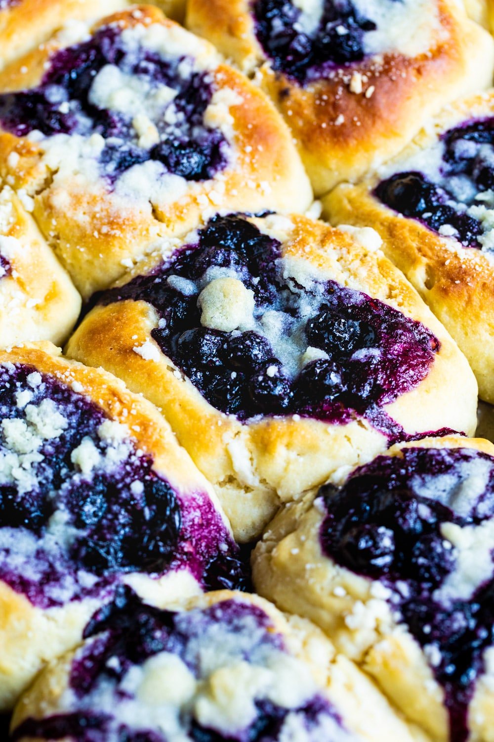 Blueberry Kolaches on a baking sheet.