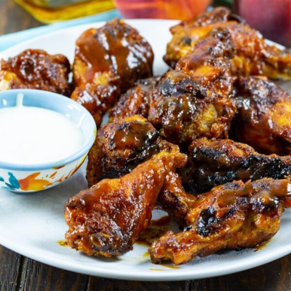 Bourbon Peach BBQ Wings on a plate.