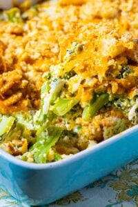 Wooden spoon scooping up Southern Broccoli Casserole.