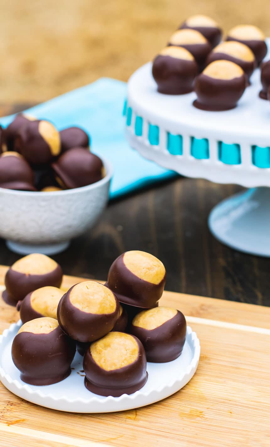 Arrangement of Buckeye Candy on a plate, bowl, and cake stand.