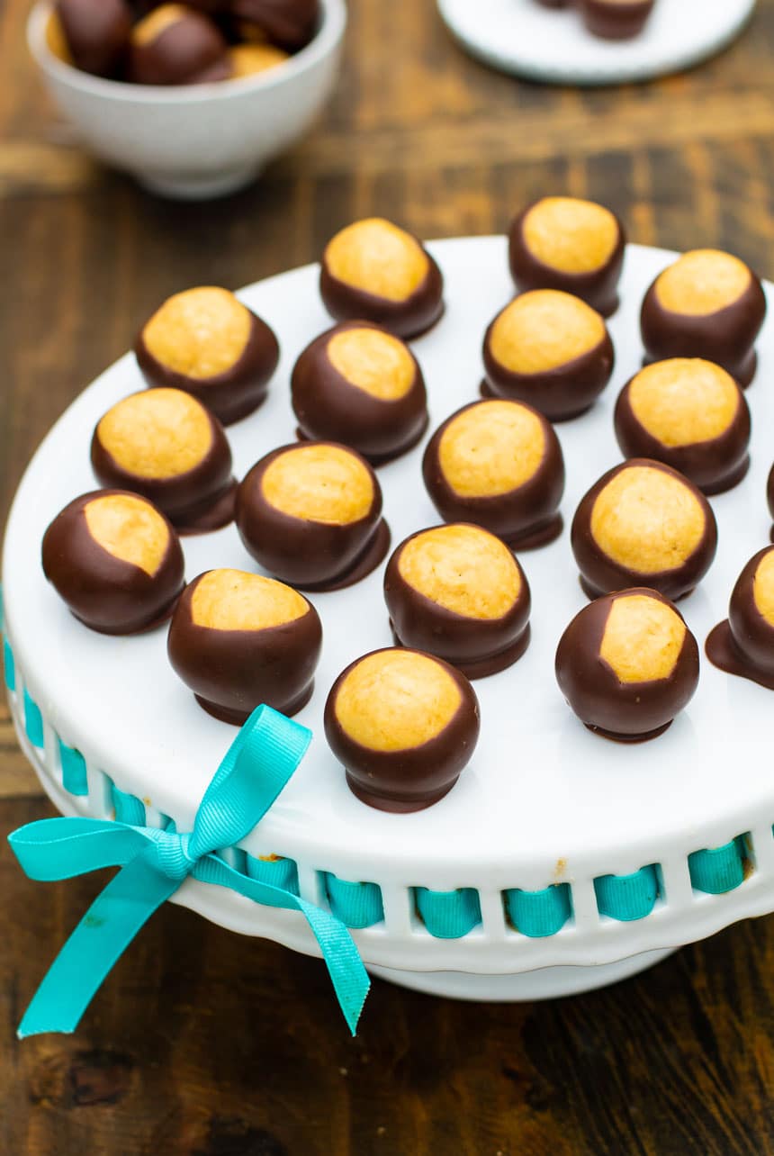 Buckeye Balls on a cake stand.