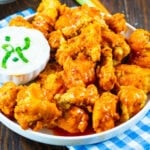 Buffalo Chicken Nuggets on a plate with Blue cheese dipping sauce.