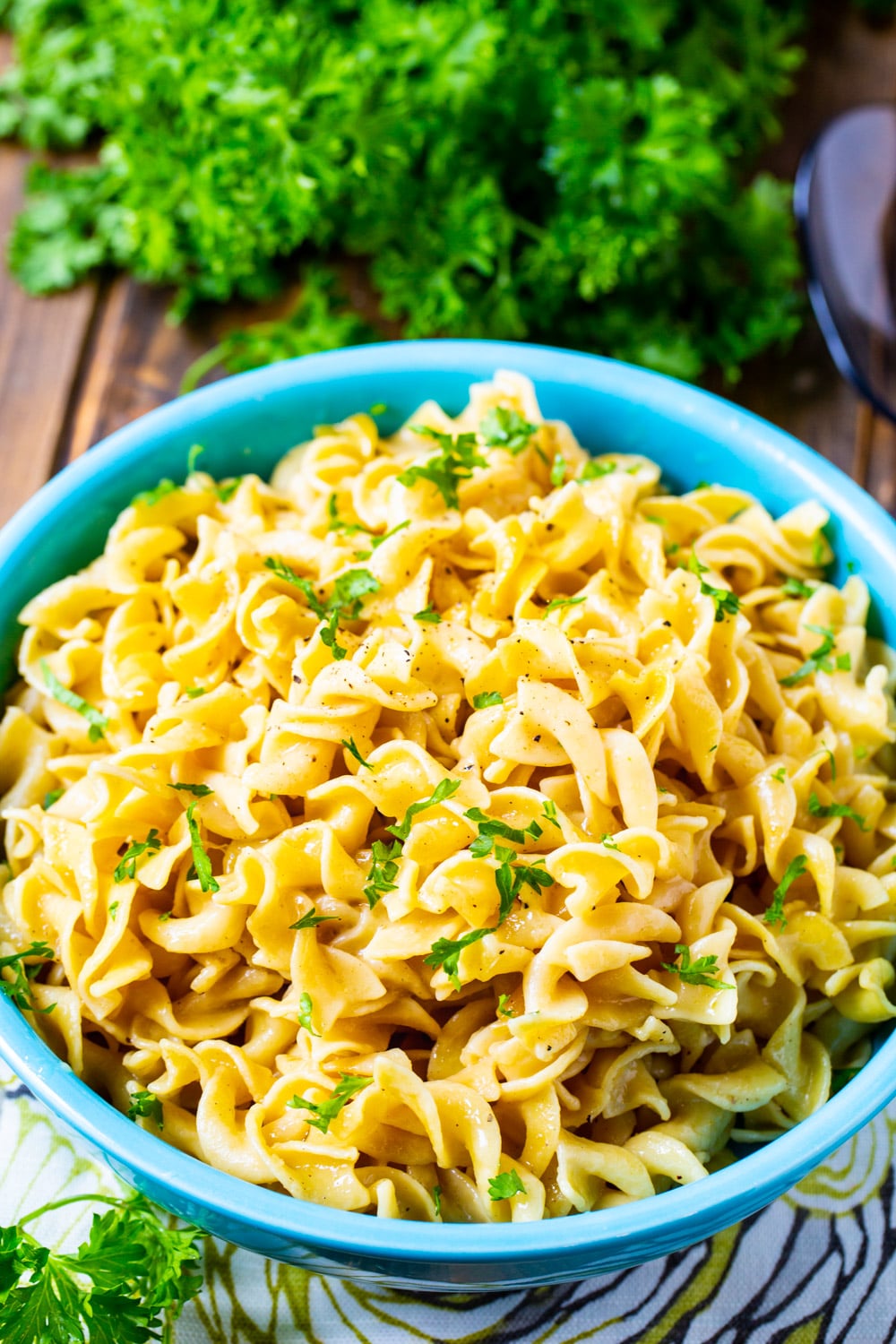 Noodles in a blue serving bowl.