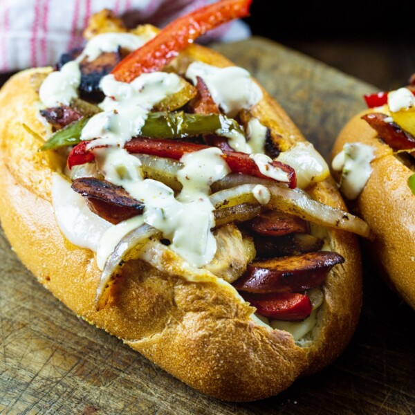 Cajun Chicken and Andouille Sub on a wooden board.