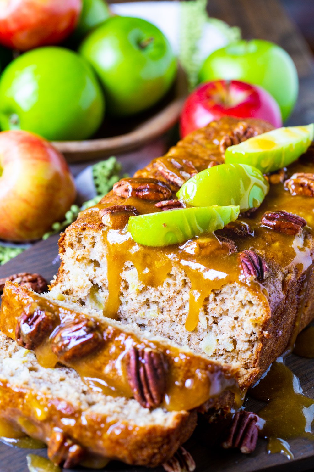 Caramel Apple Bread loaf with several slices cut.