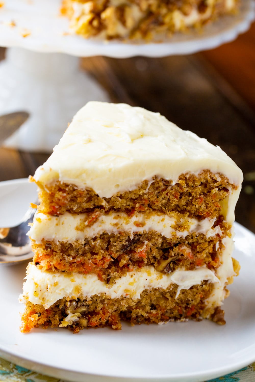 Slice of Mama Dip's Carrot Cake on a plate.