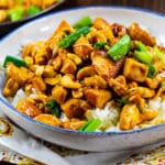Cashew Chicken over rice in a bowl.