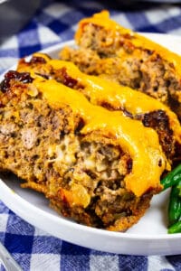Three slices of Cheesy Chipotle Meatloaf on a plate.