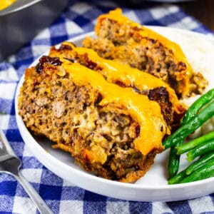 Three slices of Cheesy Chipotle Meatloaf on a plate.