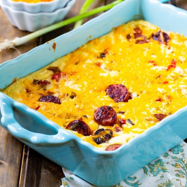 Grits Casserole in a blue casserole dish.