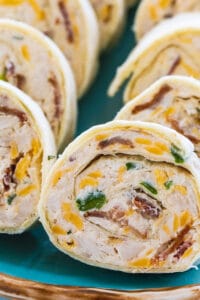 Chicken, Bacon, and Ranch Pinwheels on blue serving plate.