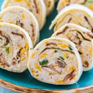 Chicken, Bacon, and Ranch Pinwheels on blue serving plate.