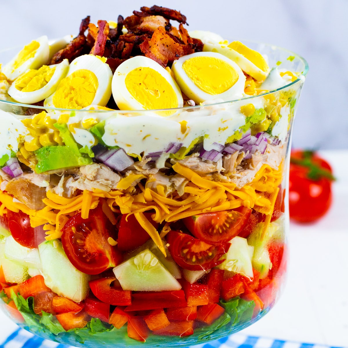 Chicken Bacon Ranch Layer Salad in a trifle bowl.