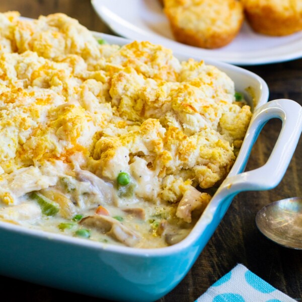 Cobbler with chicken in a baking dish.