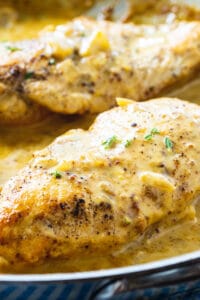 Chicken with Creole Mustard Sauce in a skillet.