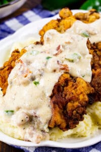 Chicken Fried Steak with Jalapeno Bacon Gravy over mashed potatoes.