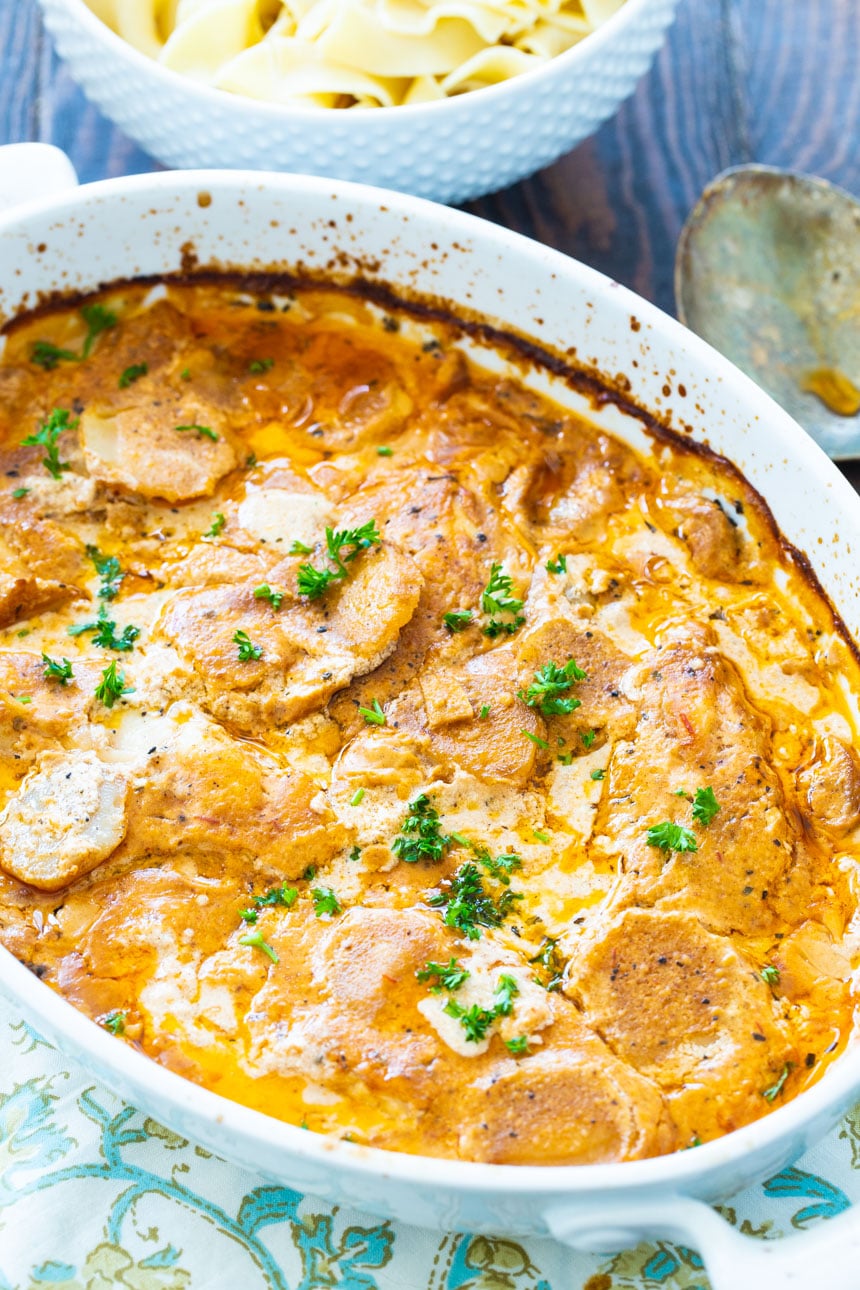 Chicken Paprikash in an oval baking dish.