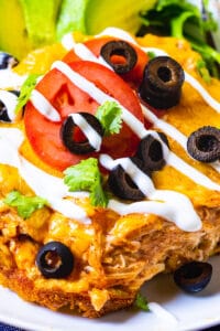 Slice of Spicy Chicken Tamale Casserole on a plate.