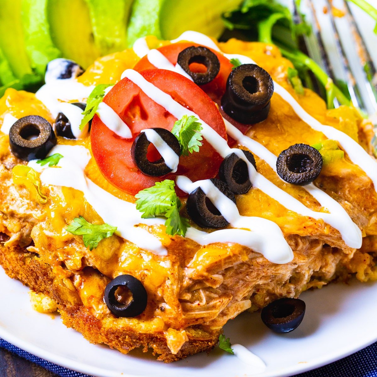 Slice of Spicy Chicken Tamale Casserole on a plate.