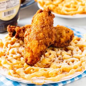Fried chicken served on a funnel cake