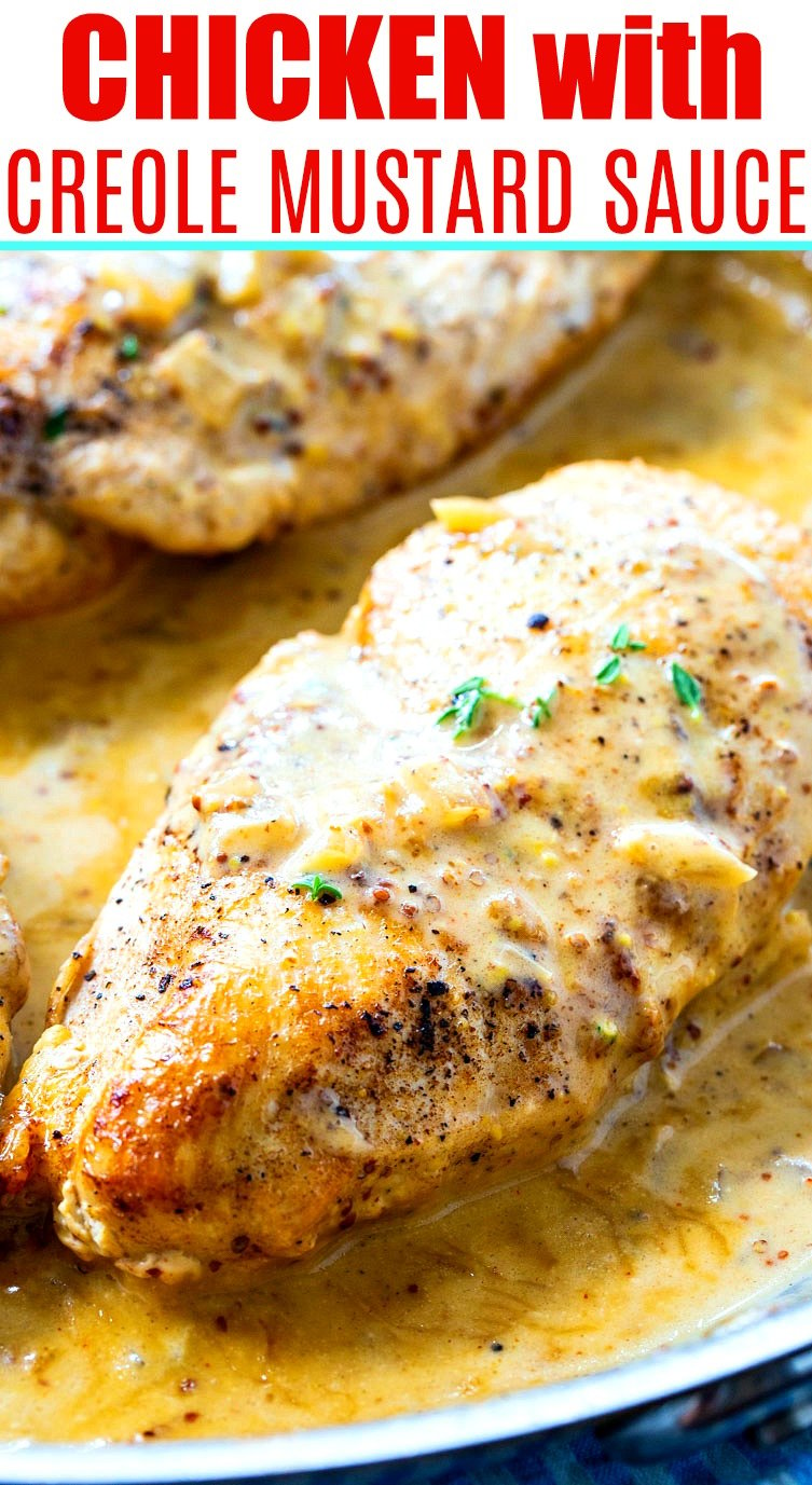 Chicken breats in a skillet coated with creole mustard sauce