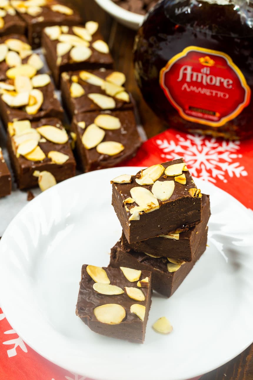 Three pieces of fudge on a plate.